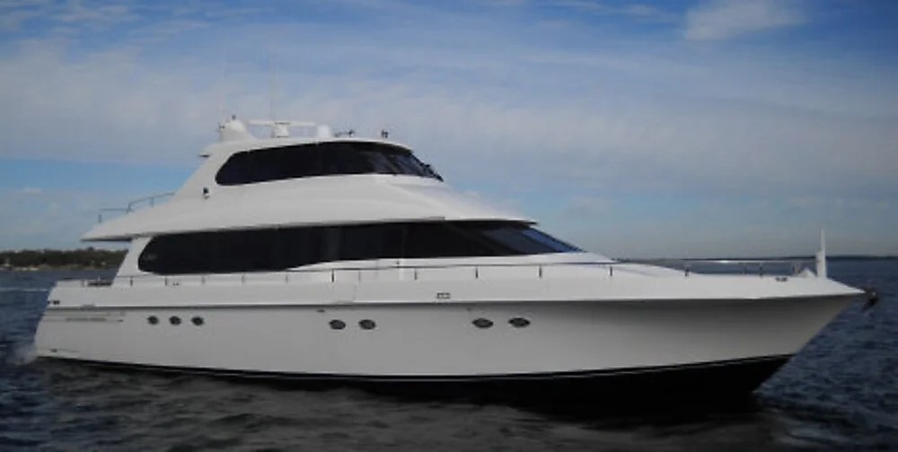 At Ease, a 76-foot Lazzara Sky Lounge motor yacht, cruising on the Gulf Coast